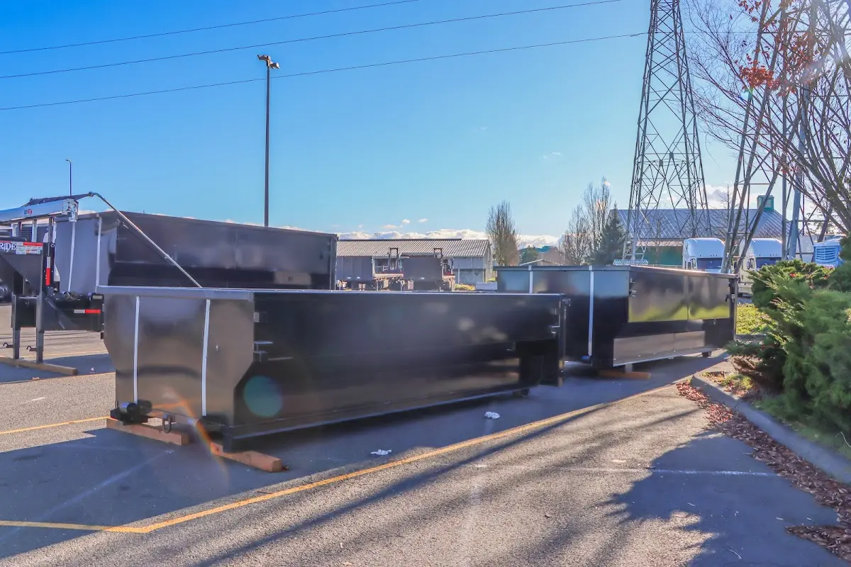 Roll-off dumpster ready for waste disposal at job site for Roofing Dumpster Rental in Howland Center